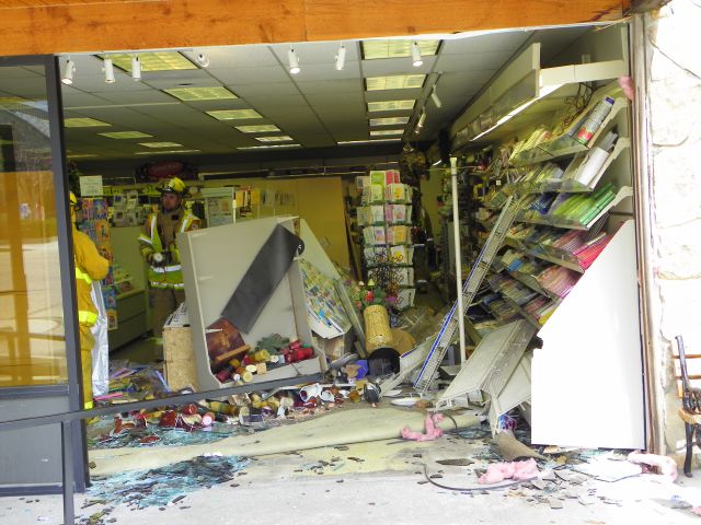 Front of the Peaks Hallmark store in Estes Park after the car was removed.