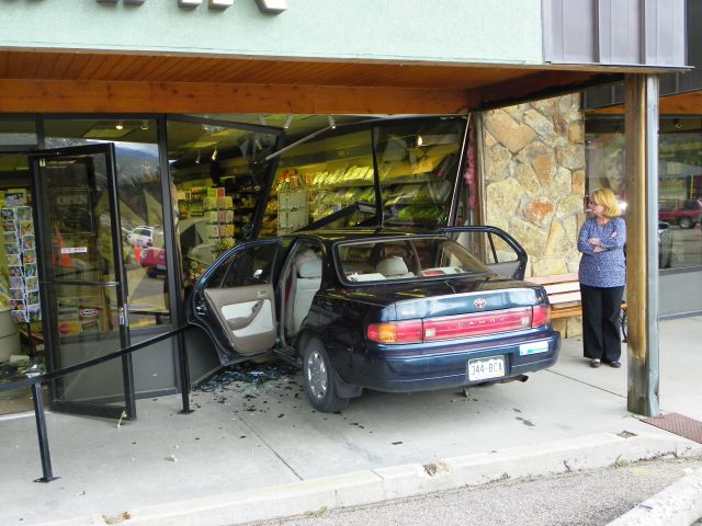Toyota goes through the front of the Peaks Hallmark store in Estes Park